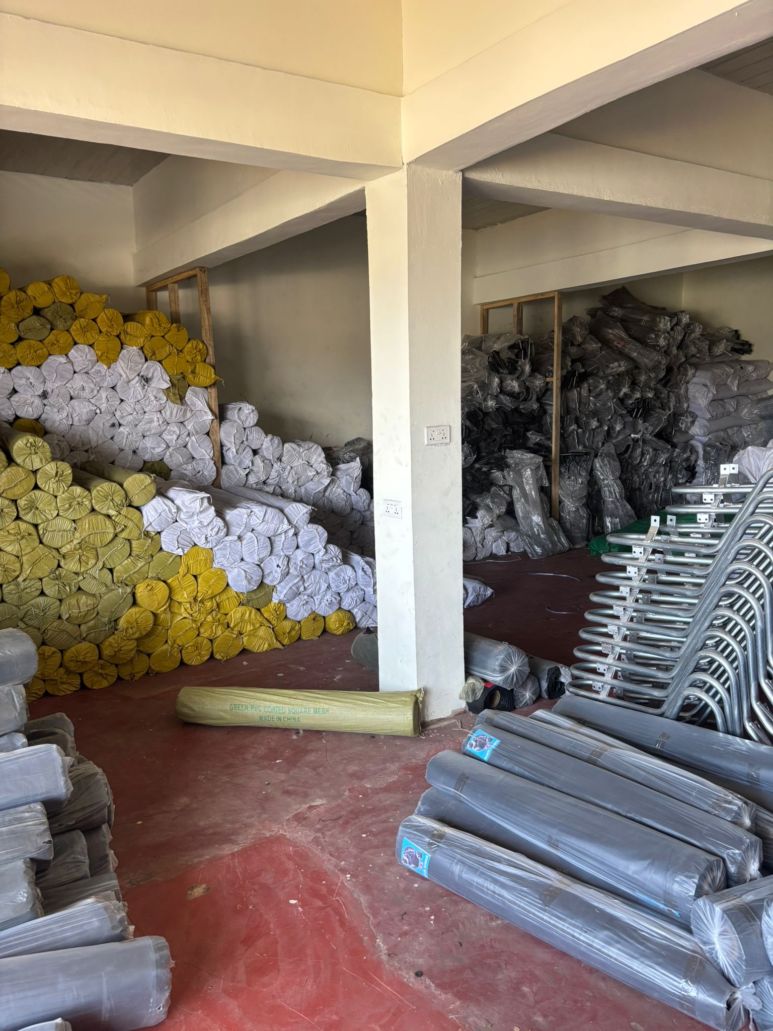 Roofing materials and steel sheets organized storage at Danwuk Enterprise warehouse